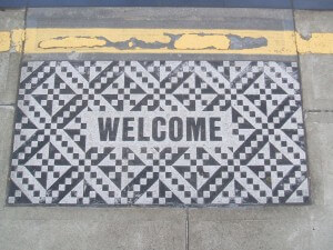 welcome mat on porch