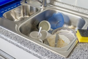 dishes in kitchen sink