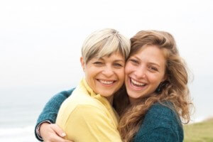 mom and daughter laughing